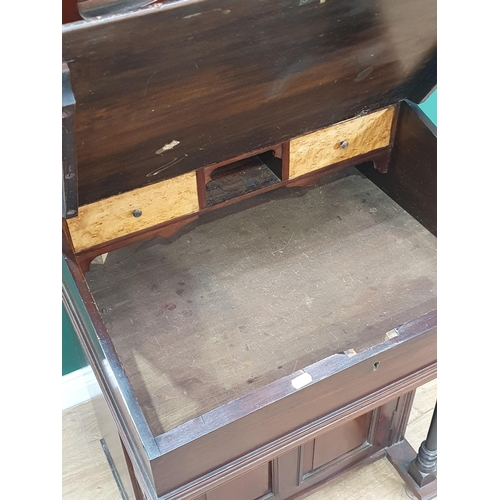 33 - A mahogany Davenport with Cabinet, the cabinet with glazed door above lift up writing surface, with ... 