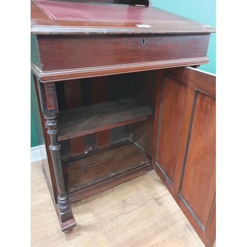 33 - A mahogany Davenport with Cabinet, the cabinet with glazed door above lift up writing surface, with ... 