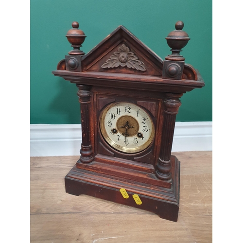 38 - A Mantel Clock with pediment, another Mantel Clock and a Circular Wall Clock by 