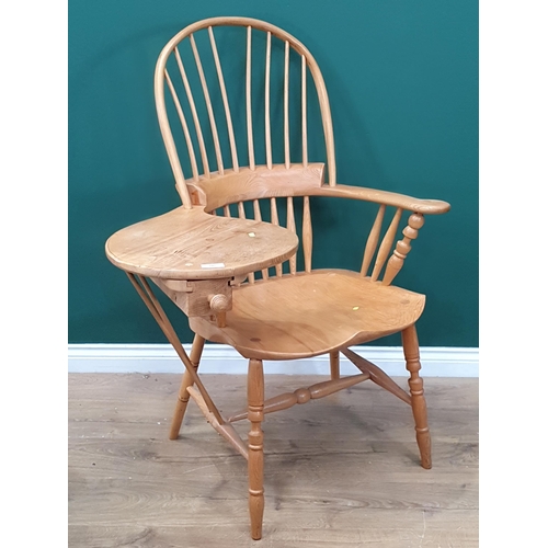 541 - A bespoke made Windsor style Ash Reading Chair with spindle back, the reading surface fitted small d... 