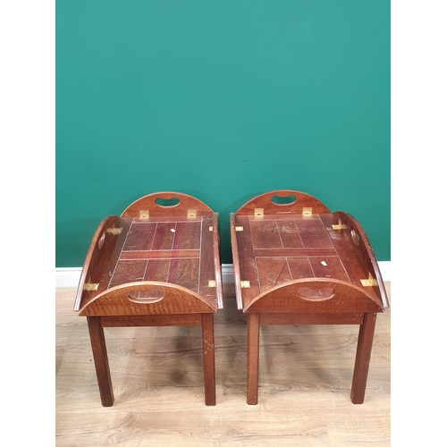 542 - A pair of reproduction mahogany and brass folding top Butler Trays on stands.