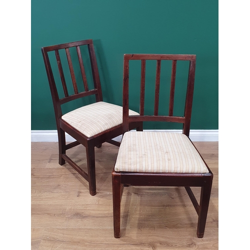 546 - A pair of 18th Century yew wood Side Chairs with bar backs, drop-in seats and squared supports and s... 