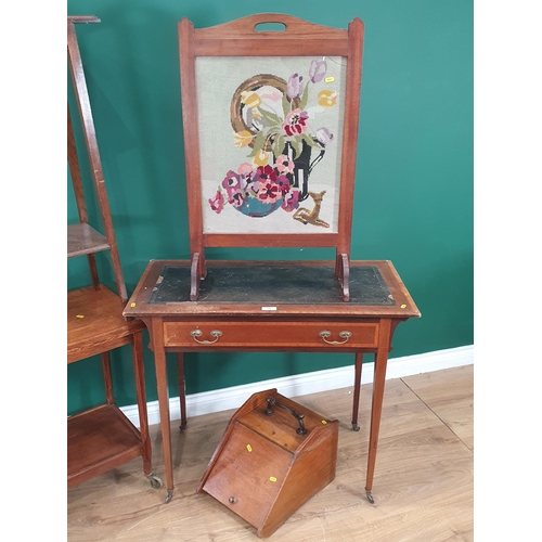 55 - An oak Tea Trolley with fold over card table top, a mahogany and inlaid Writing Table, an oak two ti... 