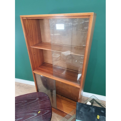 58 - A glazed Bookcase 4ft 9