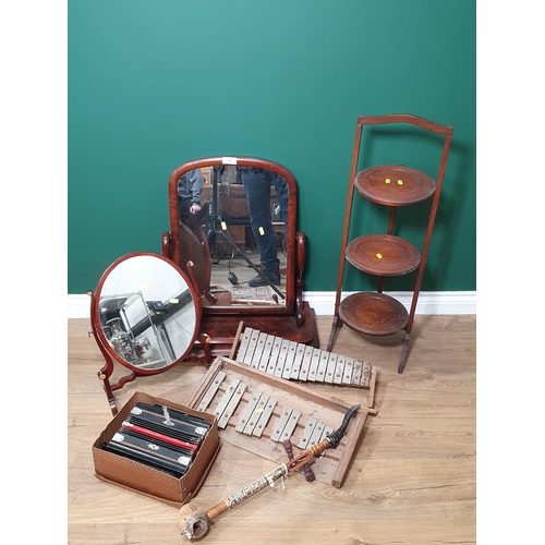 585 - A mahogany swing Dressing Table Mirror on plinth base, another Dressing Mirror, an oak folding Cake ... 