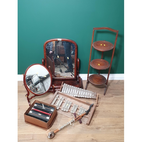 585 - A mahogany swing Dressing Table Mirror on plinth base, another Dressing Mirror, an oak folding Cake ... 