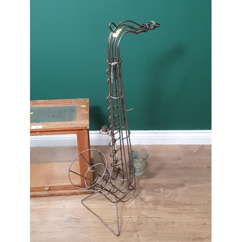 586 - A glazed Scales Cabinet, a Yard of Ale style glass and stand, and a wirework saxophone Candle Holder... 