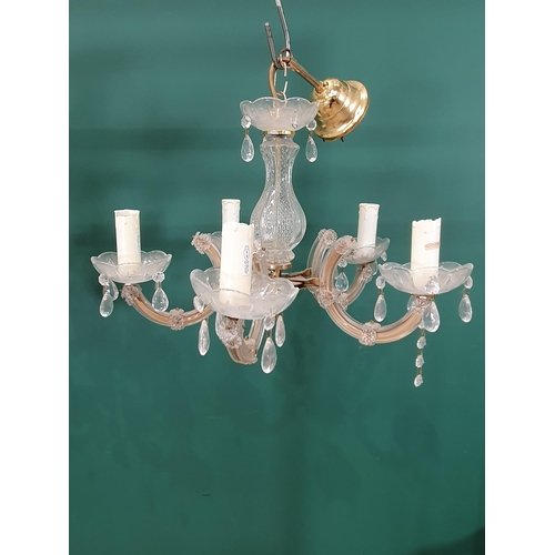 595 - Three glass Chandeliers with brass mounts