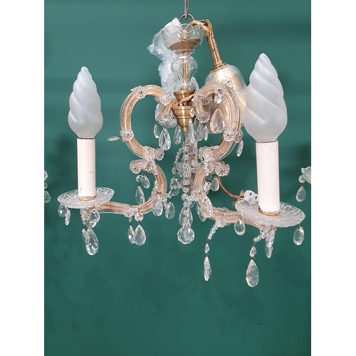 595 - Three glass Chandeliers with brass mounts