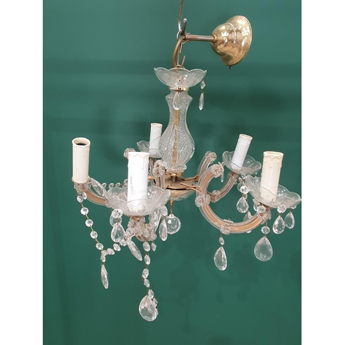 595 - Three glass Chandeliers with brass mounts