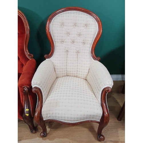 599 - Two Victorian button upholstered spoon back Armchairs, and an Armchair with striped upholstery on tu... 