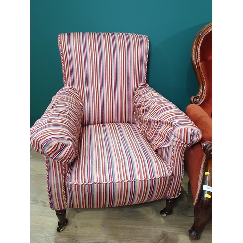 599 - Two Victorian button upholstered spoon back Armchairs, and an Armchair with striped upholstery on tu... 