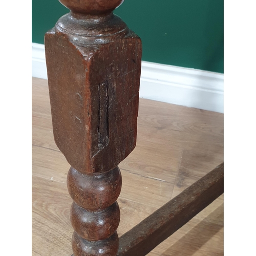 6 - An antique oak Lowboy, with single fitted drawer on bobbin turned supports and square cut stretchers... 