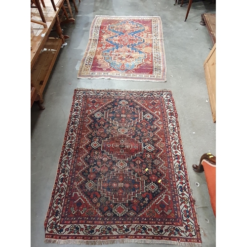 600 - A Kashgai Rug, multi-bordered with central medallions on a red ground, 5ft 10in x 3ft 7in and a Shir... 