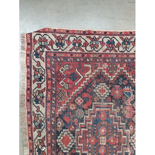 600 - A Kashgai Rug, multi-bordered with central medallions on a red ground, 5ft 10in x 3ft 7in and a Shir... 