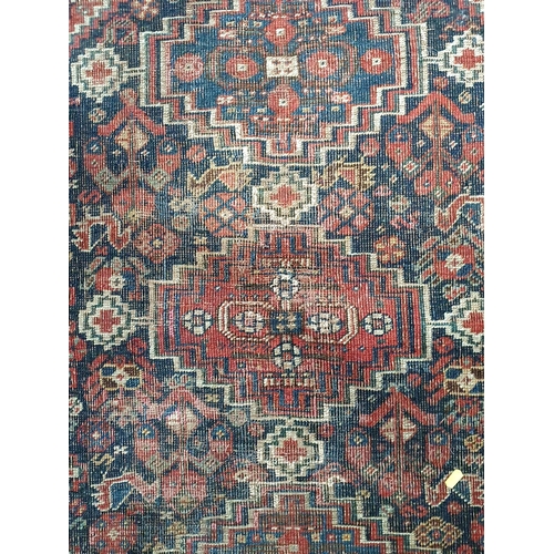 600 - A Kashgai Rug, multi-bordered with central medallions on a red ground, 5ft 10in x 3ft 7in and a Shir... 