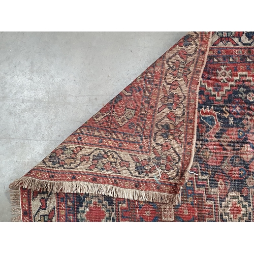 600 - A Kashgai Rug, multi-bordered with central medallions on a red ground, 5ft 10in x 3ft 7in and a Shir... 