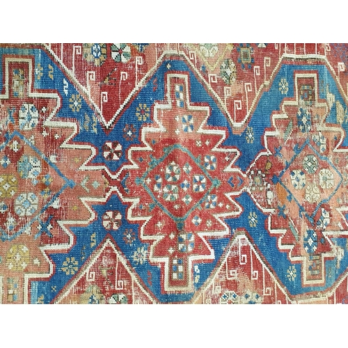 600 - A Kashgai Rug, multi-bordered with central medallions on a red ground, 5ft 10in x 3ft 7in and a Shir... 