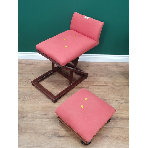 604 - A mahogany framed pink upholstered adjustable Gout Stool and a pin upholstered Footstool.