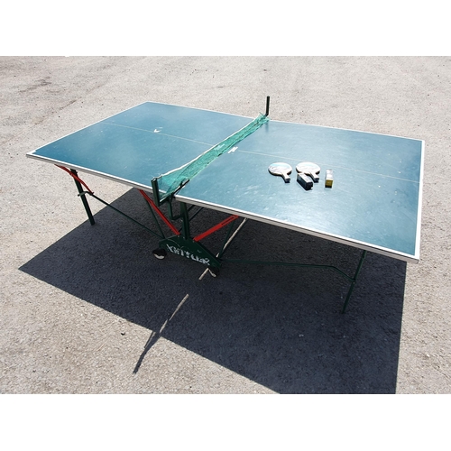 614 - A Kettler folding Table Tennis Table including bats balls and net, A/F and missing one net support