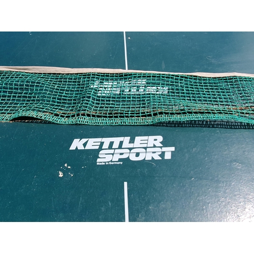 614 - A Kettler folding Table Tennis Table including bats balls and net, A/F and missing one net support