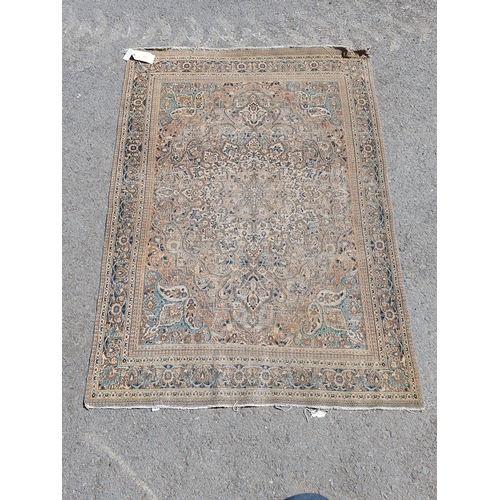 617 - A small Persian Rug with multi-borders and stylised floral motifs, heavily worn, 5ft 11in x 4ft