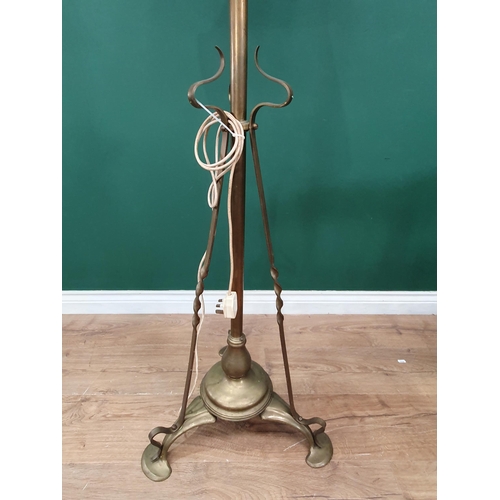 395 - A brass telescopic Standard Lamp on tripod base A/F. (Failed PAT Test)