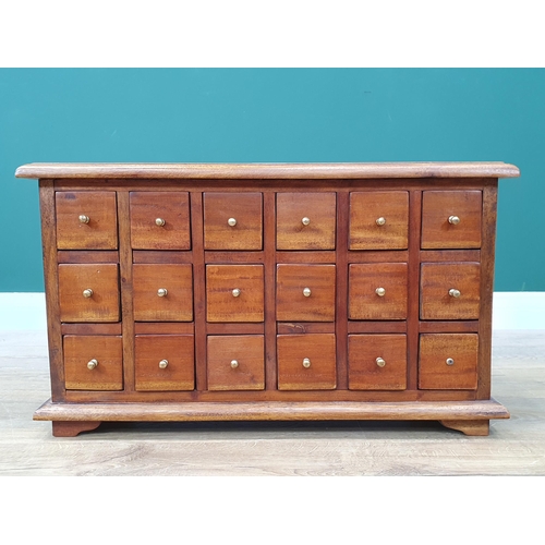 10 - A Hardwood Bank of Eighteen small Drawers, 2ft 2