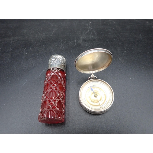 108 - A Victorian silver cased Compass, Birmingham 1898, and an Edward VII silver lidded ruby glass Scent ... 