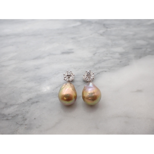 169 - A pair of simulated Baroque Pearl Earrings each peg-set round and two marquise cz above single irrad... 