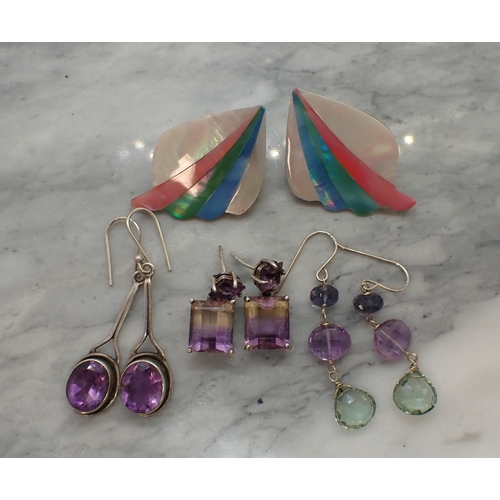 176 - A pair of Ametrine Earrings each corner claw-set step-cut stone suspended below smaller amethyst sta... 