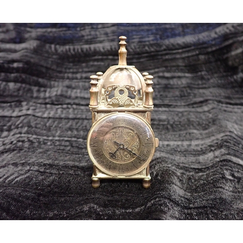 201 - A miniature brass Lantern Clock, 4in