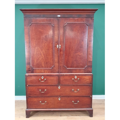 23 - A 19th Century mahogany Linen Press the top section fitted pair of moulded doors, above the base fit... 