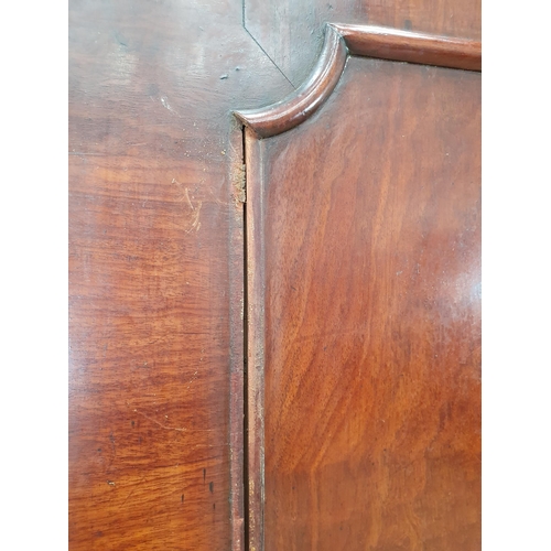 23 - A 19th Century mahogany Linen Press the top section fitted pair of moulded doors, above the base fit... 