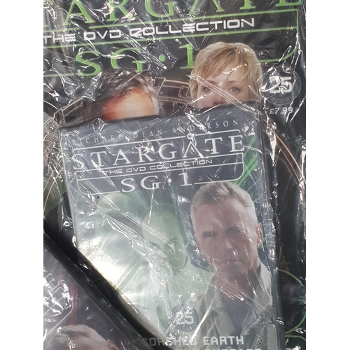 259 - A Box of Stargate DVD's and Magazines.