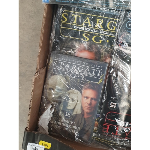 259 - A Box of Stargate DVD's and Magazines.