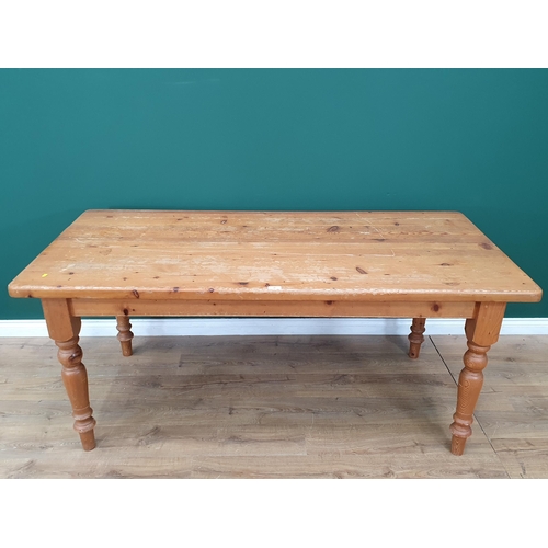 26 - A modern pine Kitchen Table on turned supports, 6ft Long x 3ft Wide x 2ft 7