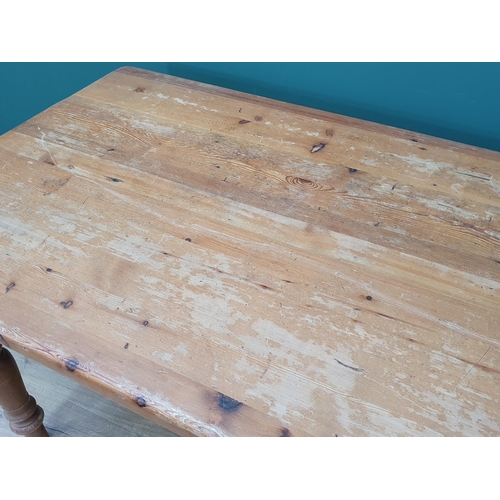 26 - A modern pine Kitchen Table on turned supports, 6ft Long x 3ft Wide x 2ft 7