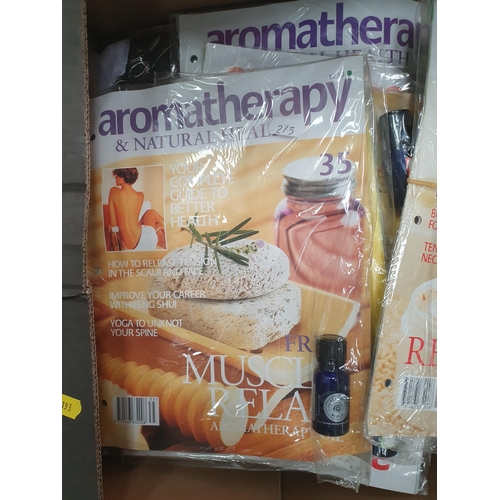 275 - A Box of Treasures of the Earth Magazine and a Box of Aromatherapy and Natural Health Magazine.