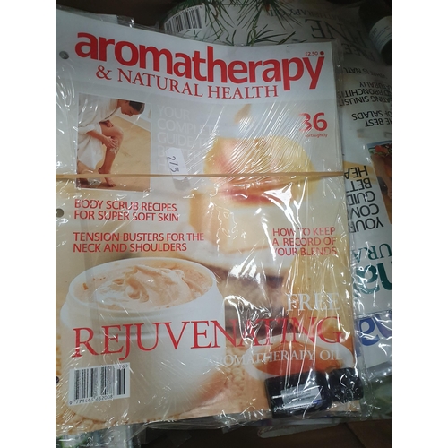 275 - A Box of Treasures of the Earth Magazine and a Box of Aromatherapy and Natural Health Magazine.