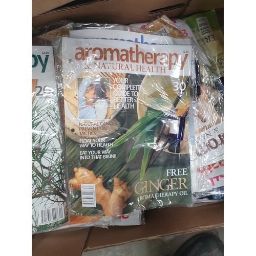 275 - A Box of Treasures of the Earth Magazine and a Box of Aromatherapy and Natural Health Magazine.