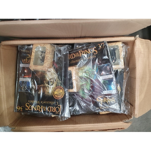 276 - Two Boxes of The Lord of the Rings Collector's Models and Magazines including, Gandalf, Gothmog, Sar... 