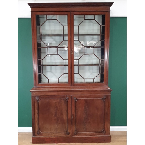 280 - A mahogany glazed top Bookcase, the dentil frieze cornice above pair of astragal glazed doors enclos... 