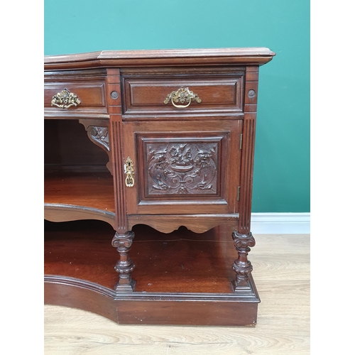 284 - A mahogany Sideboard fitted three drawers above open shelves and pair of leafage carved panel doors,... 