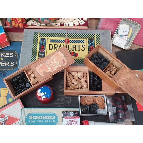 289 - A box of assorted Board Games including, Scrabble, Draughts, a Viewfinder, a Staunton Chess Set. etc... 