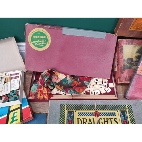 289 - A box of assorted Board Games including, Scrabble, Draughts, a Viewfinder, a Staunton Chess Set. etc... 