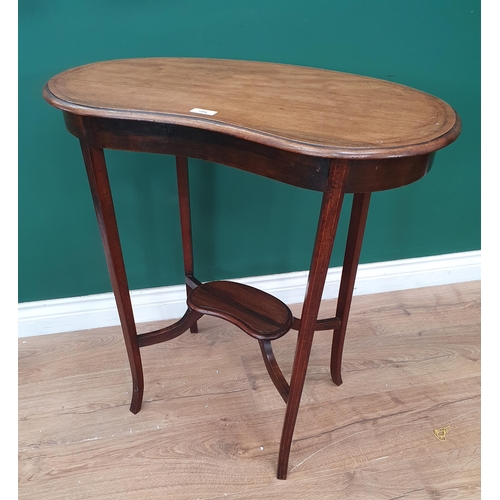 294 - A Kidney shaped two tier Occasional Table on tapered supports and a modern white painted Wall Mirror... 