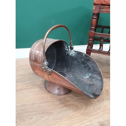 296 - A mahogany framed pink upholstered Stool on turned supports and spindles, and a copper Coal Bucket.