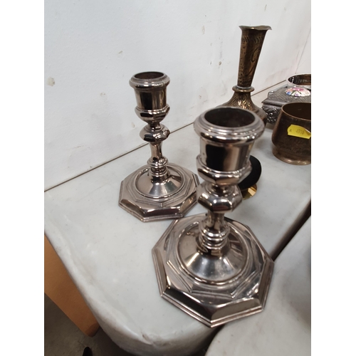 308 - A plated Candelabra and matching Candlesticks, a Thermos Hotwater Jug, a pair of brass Vases, etc