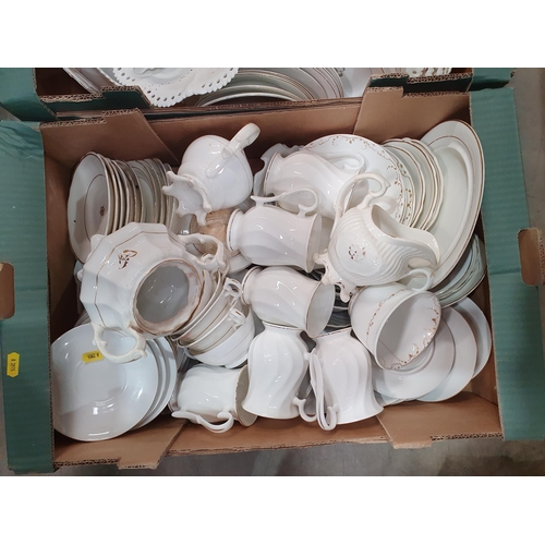 316 - Five boxes containing a large quantity of white and gilt Dinnerware,